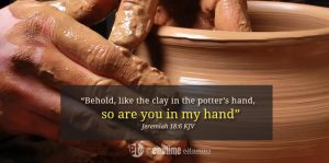 clay in the potter hand